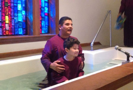 Rodrigo Azofeifa during a baptism 